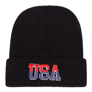 Black knit beanie hat with USA embroidery and red-blue contrast for winter skiing