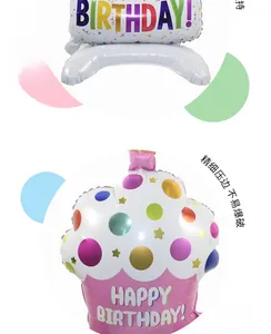 Close-up of three-layer cupcake foil balloons with Birthday text and colorful patterns