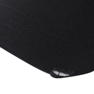 Close-up of black cotton baseball cap brim with six-row stitching and distressed edge