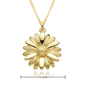 Detail shot of a 19.4mm golden daisy pendant necklace with a polished mirror reflection