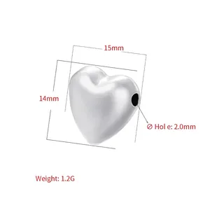 Detailed view of silver heart bead with 15x14mm dimensions and 2mm hole for DIY jewelry