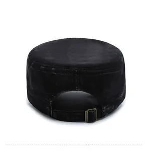 Detail of black military flat top hat back showing adjustable bronze metal buckle