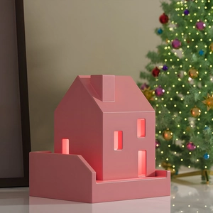 Cozy pink minimalist house lamp with warm light and festive Christmas tree background