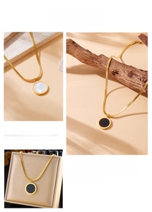Gold plated stainless steel snake chain necklace with Roman numeral round pendant detail