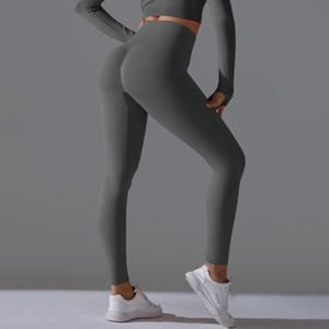 Rear view of charcoal grey high-waist seamless leggings with peach butt-lift design