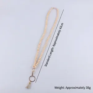 Boho wood bead teacher badge holder with tassel and gold clasp, length 43cm weight 38g