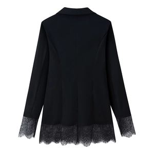 Detailed back view of black blazer with intricate lace stitching on sleeves and hemline