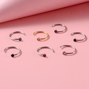 Minimalist C-shaped stainless steel nose rings set with colorful gemstones in 7 pieces