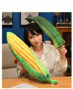 Giant plush pillows shaped like realistic corn and okra for cozy home decoration