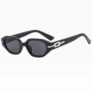 Detail of black geometric sunglasses with stylish silver rectangular metal accents