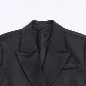 Classic black herringbone wool blazer with notch lapel and chest pocket detail for women