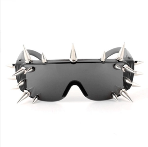 Punk style shield sunglasses with metallic silver spikes and black wide frame eyewear