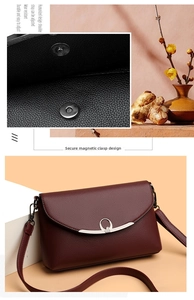Detail of the secure magnetic clasp and adjustable strap on the burgundy crossbody bag