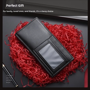 Close-up of black leather long wallet featuring a transparent ID card window with gift decor