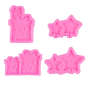 Pink silicone molds set featuring gift box and smiling star shapes for cake decorating