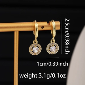 Detailed view of gold hoop earrings with large round zircon and size specifications