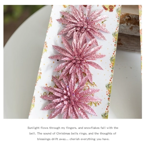 Close-up of three pink glitter artificial flowers for Christmas tree decoration set