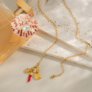 Collana in acciaio inossidabile placcato oro 18K con ciondoli tartaruga, conchiglia e peperoncino