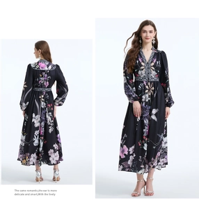 Close-up of V-neckline and tiered ruffle hem on floral long sleeve maxi dress