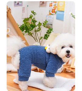 Detail of warm navy fleece pet jumpsuit with white floral 3D decor for small dogs