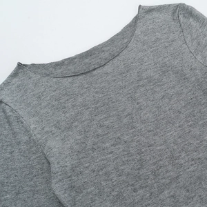 Detail shot of the boat neck collar and fine knit texture of this grey long sleeve top