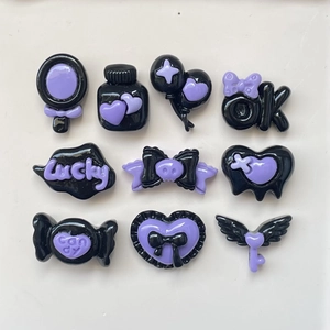 Gothic black and purple resin DIY charms kit with wings, hearts, and bow designs