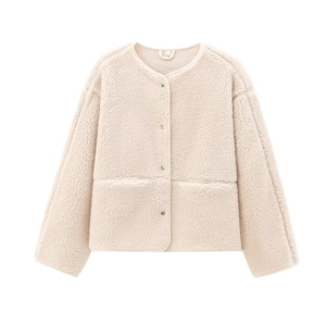 Cream white teddy fleece jacket with round neck and single-breasted buttons in a flat lay