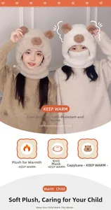 Close-up of children's warm plush capybara knit hood with integrated face mask