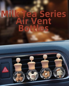 Close-up of cute cartoon car air vent perfume bottles in milk tea tones with wooden caps