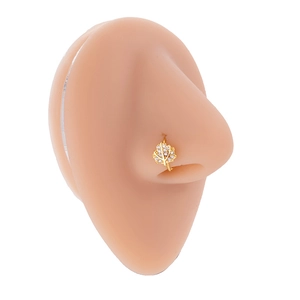 Detail of leaf-shaped gold nose ring with sparkling cubic zirconia on a model