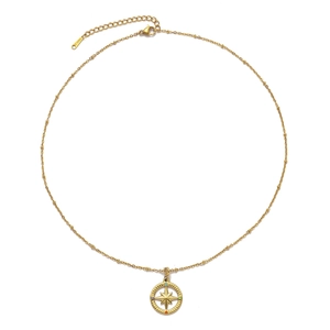 Detail of gold stainless steel star compass pendant with colorful inlaid gemstones