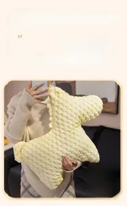 Detail of light yellow plush horse pillow with unique popcorn textured fabric