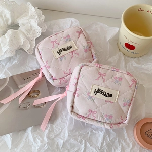 Quilted pink bow pattern organizer bag for cosmetics and sanitary pads with ribbon zipper