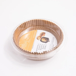 Disposable round air fryer paper liners in transparent storage box with handle
