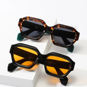 Chic polygonal square sunglasses in leopard brown and black with orange lenses