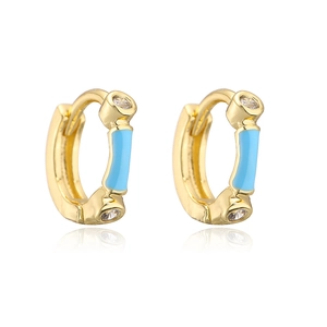 Detail of 18K gold-plated copper hoop earrings with blue enamel and zircon stones