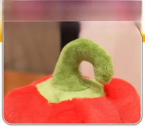 Close-up of soft plush red pepper toy showing premium stitching and green stem texture