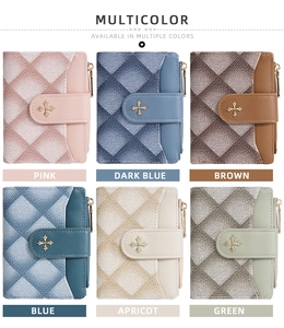 Short quilted women's wallet shown in six colors with decorative metal cross buckle