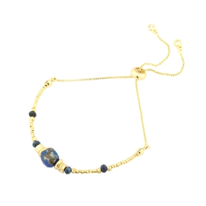 Adjustable blue sodalite beaded bracelet with gold metal beads and sliding clasp closure
