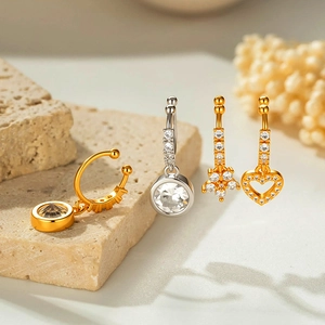 Copper cubic zirconia sun flower and heart drop earring set in gold and silver finish