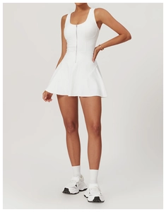 Detailed front view of white athletic dress with U-neck, metal zipper and A-line skirt