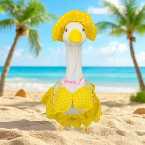 Detail of yellow polka dot bikini set and sun hat for large porch goose decoration