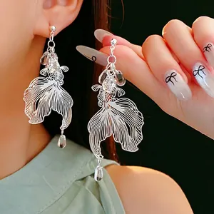 Silver hollow koi fish drop earrings with water drop pendants for women in neo-chinese style