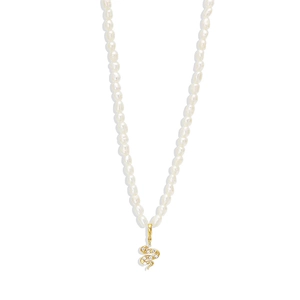 Detail of S925 silver necklace featuring white pearls and a gold snake pendant with crystals