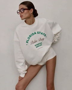 Detailed close-up of Florida State letter print on white crewneck sweatshirt
