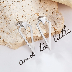 Detailed close-up showing the S925 hallmark on minimalist silver triangle stud earrings