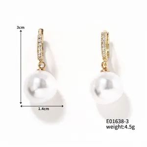Detailed view of pearl earrings with dimensions 3cm length and 1.4cm pearl width