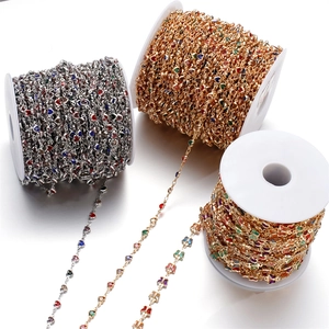 Detailed view of gold and silver plated DIY jewelry chains with colorful heart crystals