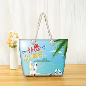 Close-up of Hello Summer canvas beach tote with nautical rope handles and summer graphics