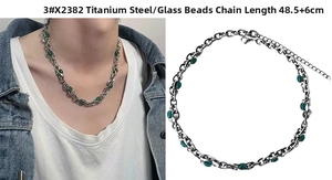 Titanium steel chain necklace with green glass beads and extension detail shown on model